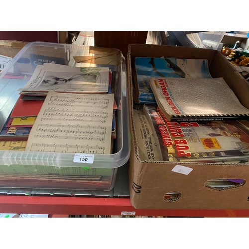 150 - 2 boxes of music sheet.