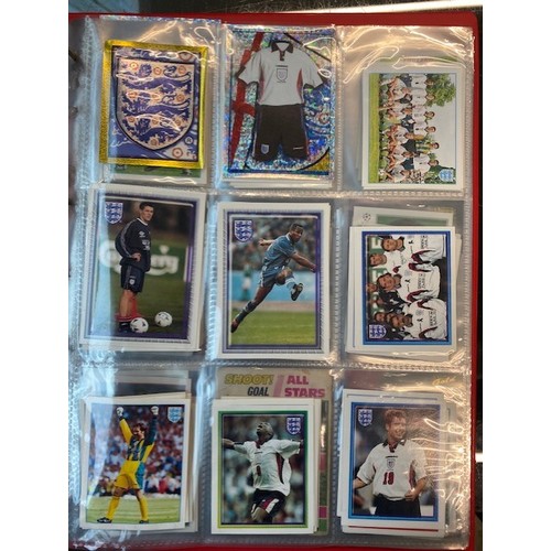 137 - A box of various albums of collectors cards related to sport to include football, basketball, cricke... 