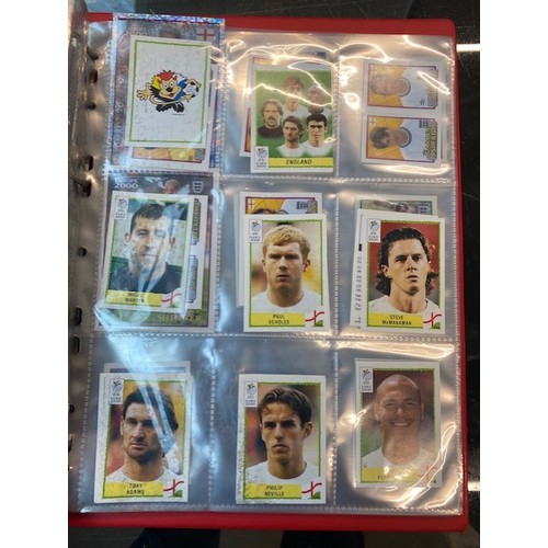 137 - A box of various albums of collectors cards related to sport to include football, basketball, cricke... 