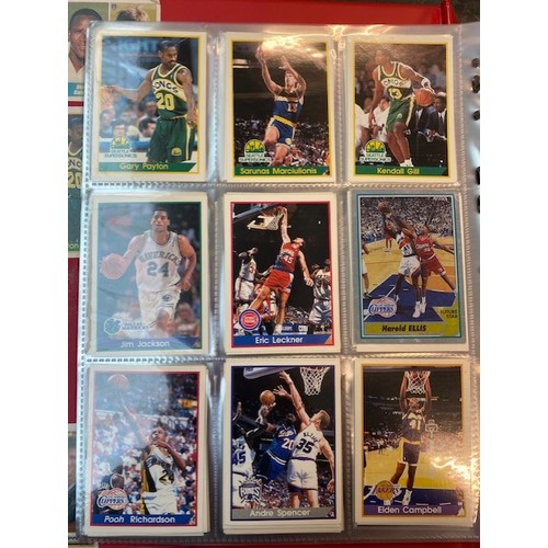 137 - A box of various albums of collectors cards related to sport to include football, basketball, cricke... 