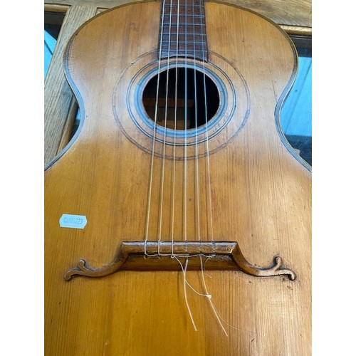 165 - A vintage handmade classical style guitar