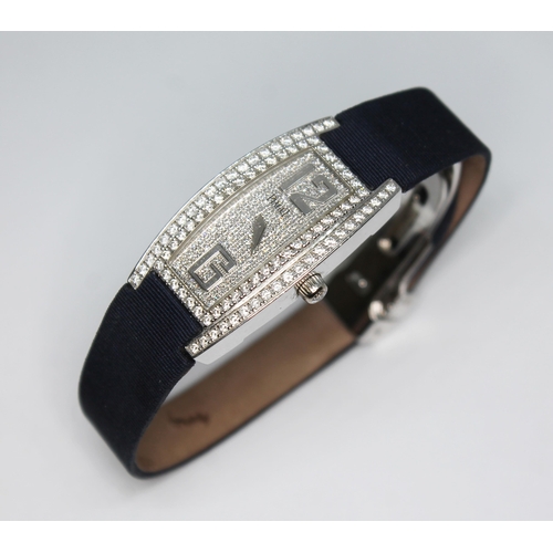 120 - A ladies Piaget Limelight Tonneau 18ct white gold pave set diamond watch, ref. G0A26055, serial no. ...