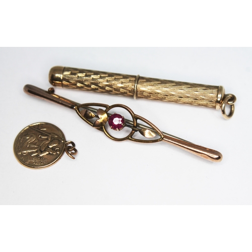 133 - A mixed lot comprising a hallmarked 9ct gold propelling tooth pick, a bar brooch marked '9ct' and a ... 