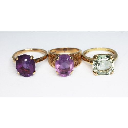 136 - Three hallmarked 9ct gold rings, two set with amethyst and the other prasiolite, gross wt. 11.26g, s... 