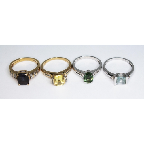 138 - A group of four coloured gemstones and diamond rings, all hallmarked 9ct gold, gross wt. 10.24g, siz... 