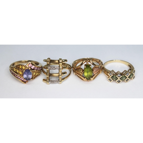 140 - Three hallmarked 9ct gold rings and another marked 10K', gross wt. 12.55g, size K-M.