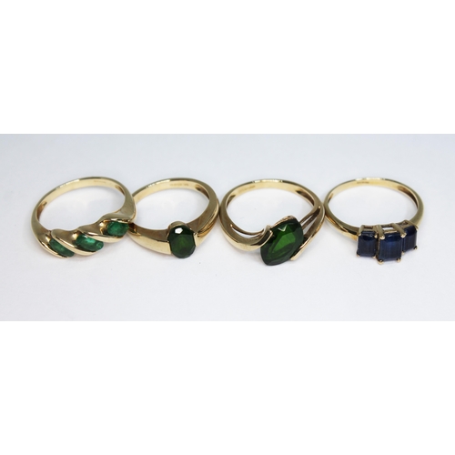 142 - A group of four hallmarked 9ct gold rings, gross wt. 7.52g, size I-L.