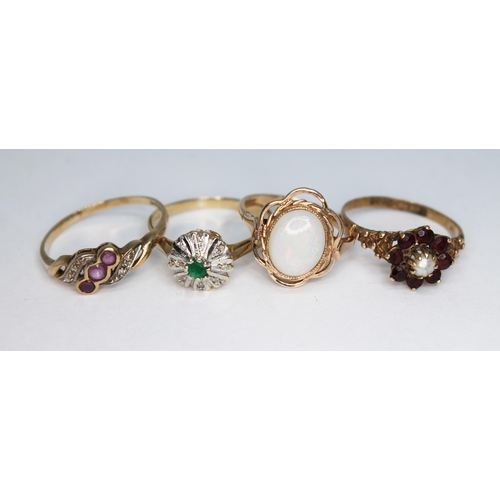 152 - A group of four hallmarked 9ct gold rings, various settings, gross wt. 8.74g, size N-R.