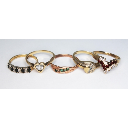 154 - A group of five hallmarked 9ct gold rings, various settings, gross wt. 9.65g, size L-N.