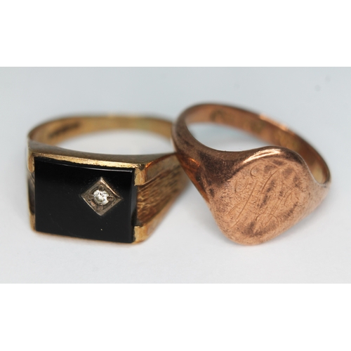 173 - Two hallmarked 9ct gold signet rings, one set with an onyx slab and a diamond, gross wt.7.98g, size ... 