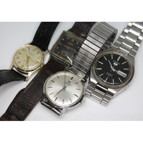 177 - A group of four wrist watches comprising a Roamer, Record De Luxe, Seiko 5 black dial and Ingersoll.