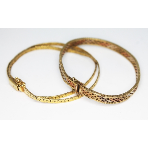 183 - Two 9ct gold bracelets, both with import marks, gross wt. 22.54g.