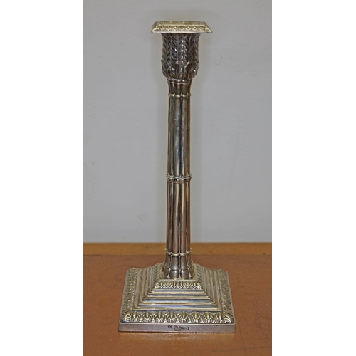 203 - A Victorian silver candlestick of Gothic column form with acanthus capitol and stepped base, William... 