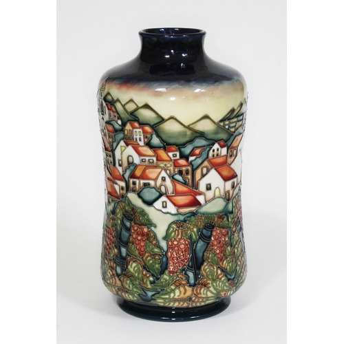 224 - A Moorcroft pottery vase decorated in Andalucian Sunset pattern by Beverley Wilkes, circa 1997, heig... 