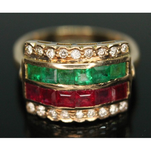 101A - A diamond, ruby and emerald four row ring, head measuring approx. 17mm x 13mm, band marked '18k', gr... 