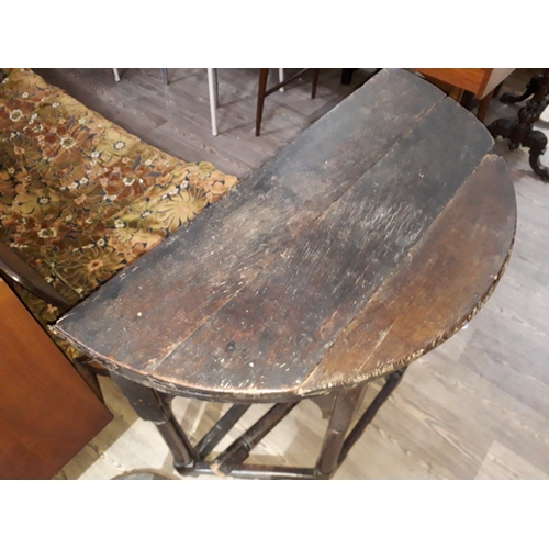 38 - An 18th century oak credence table.