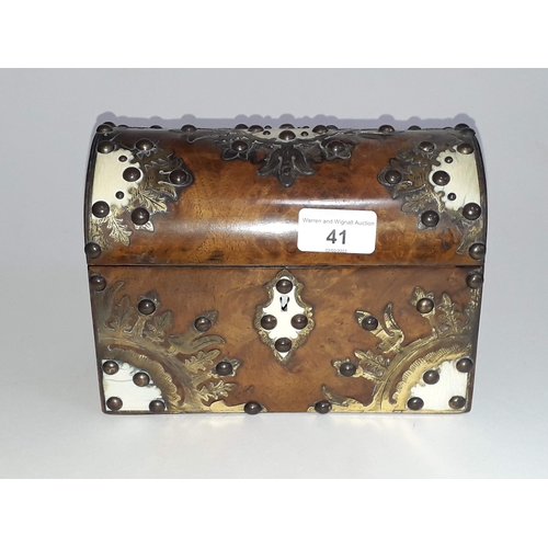 41 - A 19th century ivory, gilt metal mounted and studded domed walnut casket, length 20cm.