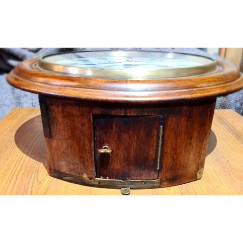 57 - An oak cased round fusee wall clock, the repainted dial bearing 'G.W.R', diam. 41.5cm.