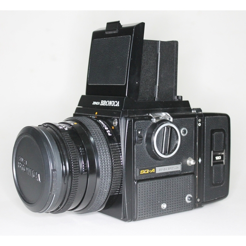 173 - A Zenza Bronica SQ-4 camera, serial no. 1245236, with five lenses comprising; Zenzanon-PS 1:2.8 f=80... 