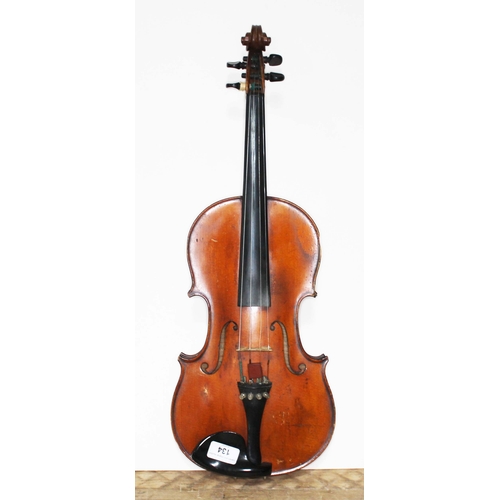 134 - An antique violin, two piece back, with two bows and hard case.