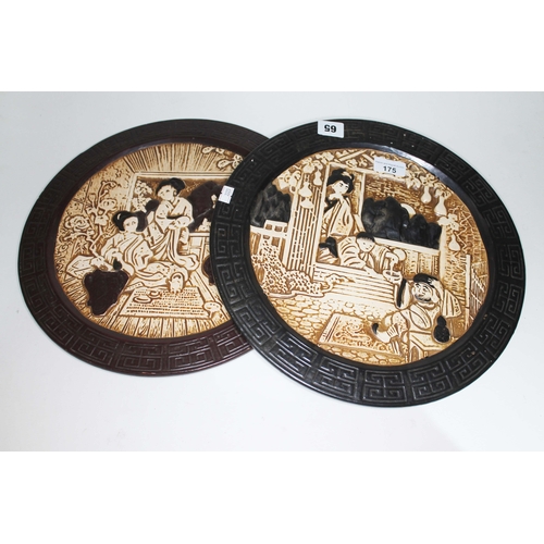 175 - A pair of 1930s Bretby Japanese design wall plates.