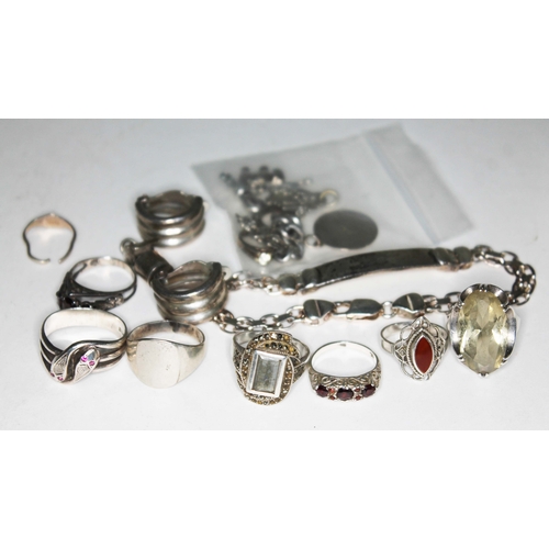 344 - A white metal jewellery box containing various silver rings, bracelets, etc.