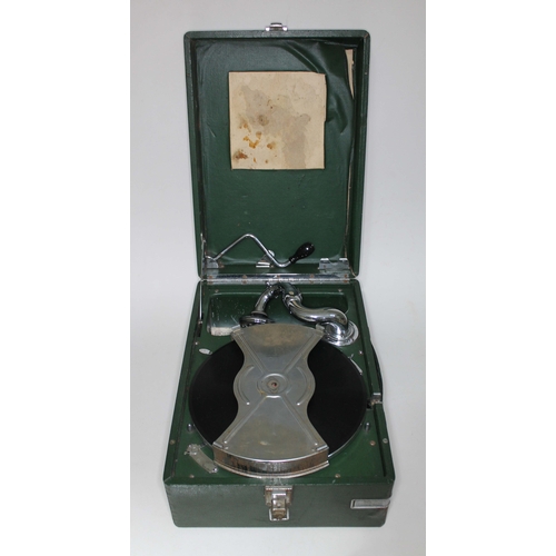 379 - A HMV model 102C green covered portable gramophone.