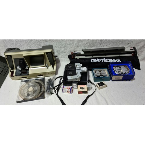 301 - A cine camera and accessories including tripods, splicers etc.