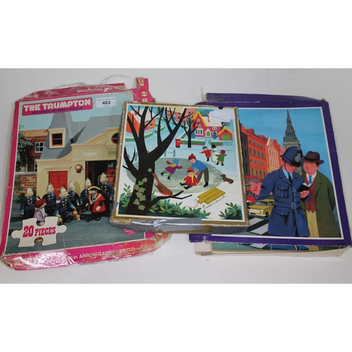 402 - Collection of three vintage wooden jigsaws.