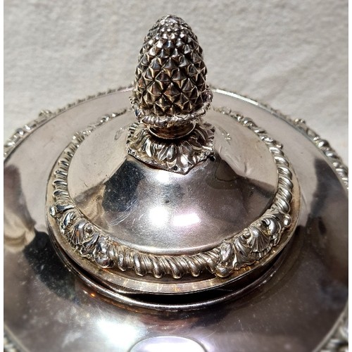 154 - A 19th century silver plated samovar with lid, sitting on square decorative base, on paw feet.