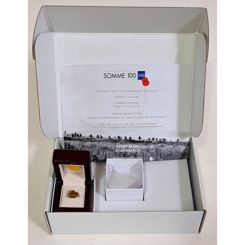 102 - A collection of Royal British Legion boxed Poppy Day items comprising a ceramic mug depicting events... 