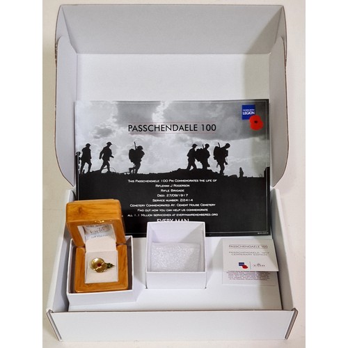 102 - A collection of Royal British Legion boxed Poppy Day items comprising a ceramic mug depicting events... 