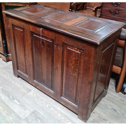 363 - An oak blanket chest with key.