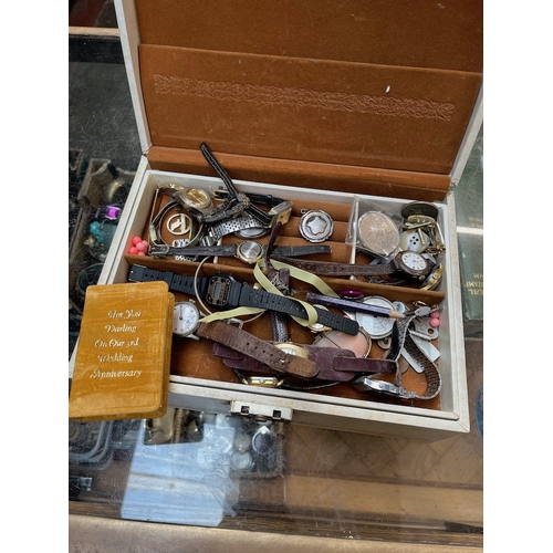 729 - A jewellery box containing wristwatches, cameo brooch etc