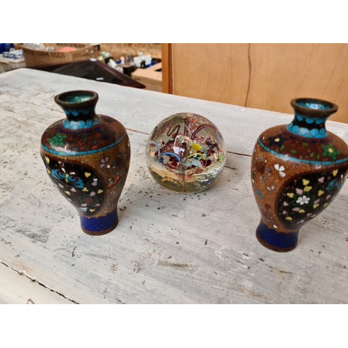 739 - A pair of cloisonne vases, 12cm high and a glass paperweight