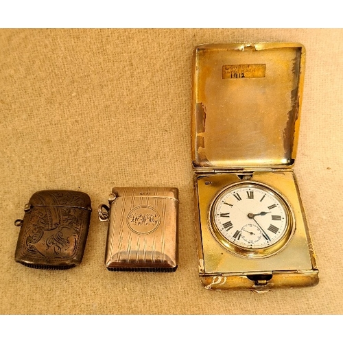 A silver pocket watch case holder, having hallmarks for 1912, London, a