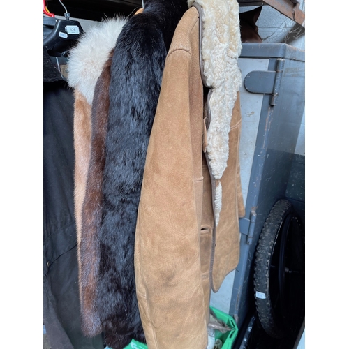 125 - Three fur coats, two mink and one rabbit, and a sheepskin coat.