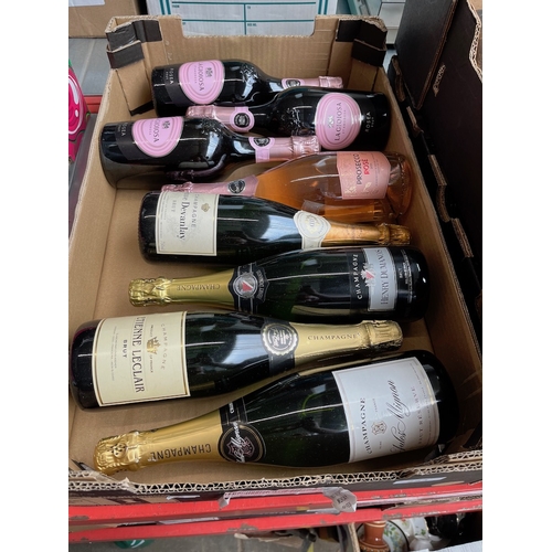 223 - 4 bottles of champagne and 4 bottles of rose prosecco.