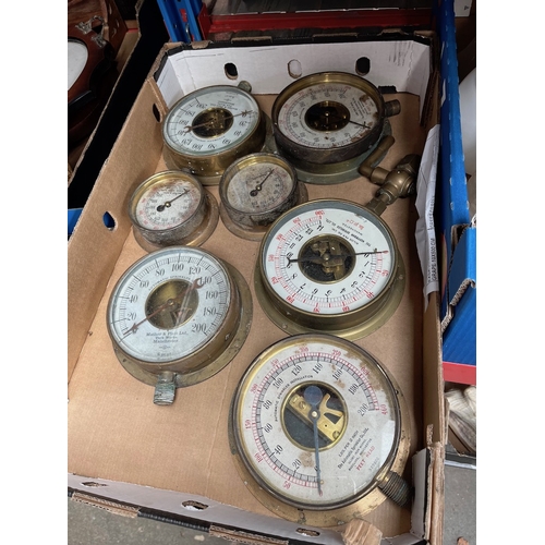 227 - A box of brass vintage gauges.