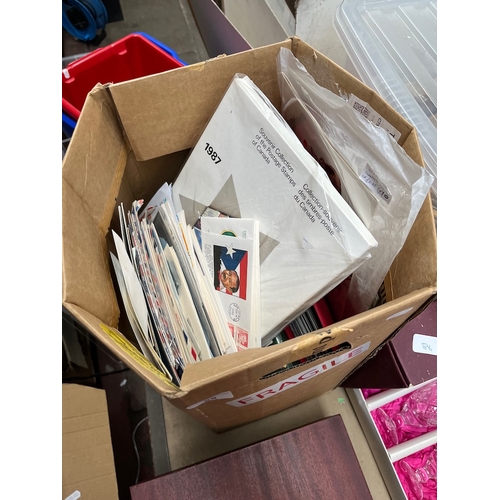 85 - A box of stamp albums and covers