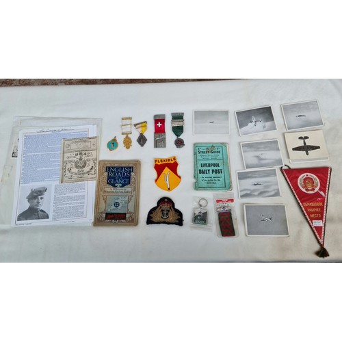 67 - A leather case containing various items of militaria including medals, photographs, masonic items, n... 