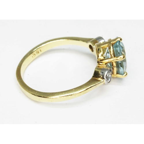 102 - An aquamarine and diamond ring, the central six claw set oval cut stone weighing approx. 1.77ct, mou... 