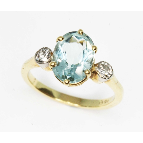 102 - An aquamarine and diamond ring, the central six claw set oval cut stone weighing approx. 1.77ct, mou... 