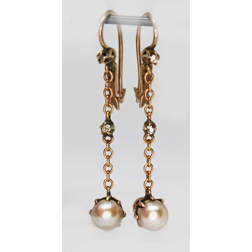 104 - A pair of antique pearl and diamond drop earrings, each split pearl measuring approx. 5.95mm in diam... 