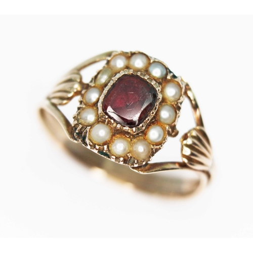 105 - A mid 19th century split pearl and garnet ring, the cluster measuring approx. 10.88mm x 9.33mm, unma... 