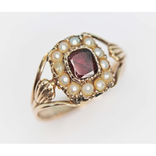 105 - A mid 19th century split pearl and garnet ring, the cluster measuring approx. 10.88mm x 9.33mm, unma... 