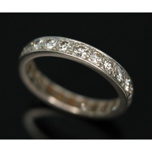 109 - An early 20th century diamond eternity ring, twenty four round transitional cut diamonds  weighing a... 