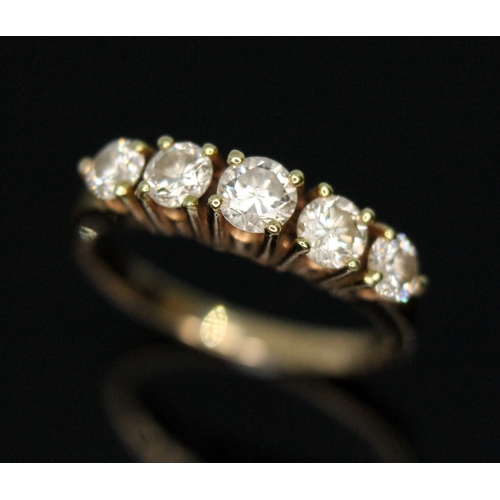 122 - A five stone diamond ring, the round brilliant cut diamonds weighing approx. 0.16, 0.20, 0.24, 0.17 ... 