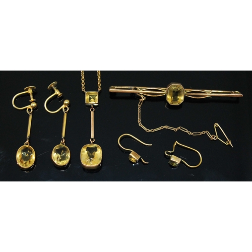 126 - A suite of citrine set jewellery, early 20th century, comprising pendant necklace, bar brooch and pa... 