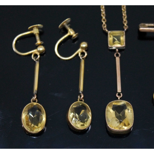 126 - A suite of citrine set jewellery, early 20th century, comprising pendant necklace, bar brooch and pa... 